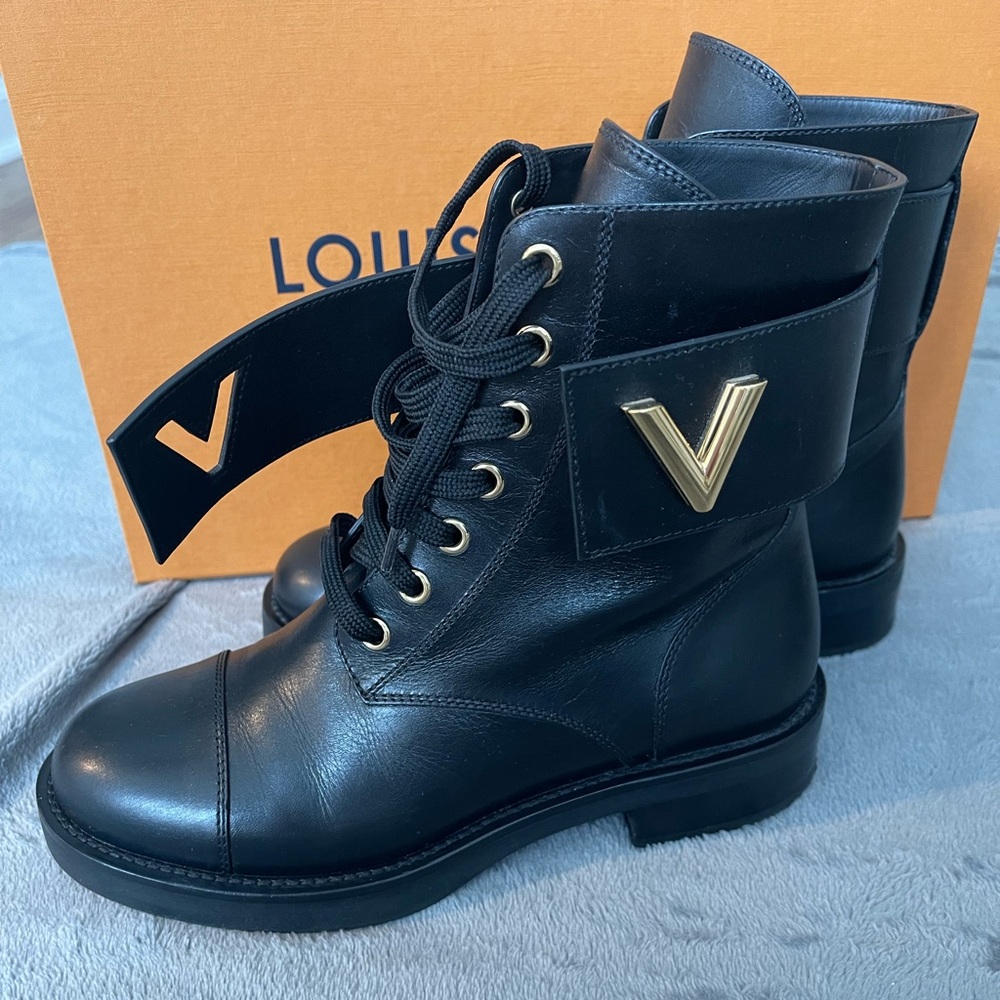 Louis Vuitton boots. Size 36. Black with gold hardware.